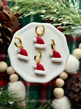 Load image into Gallery viewer, Santa Hat Huggie Hoops
